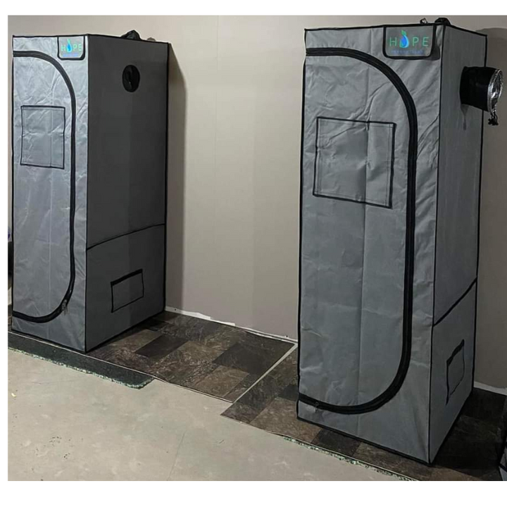 Two Eden Tower hydroponic tents in use, optimizing temperature and environment for indoor gardening.
