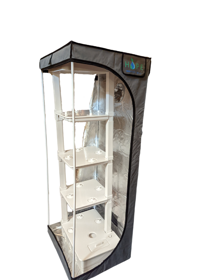 Eden Tower in a grow tent for easy temperature and environment control.